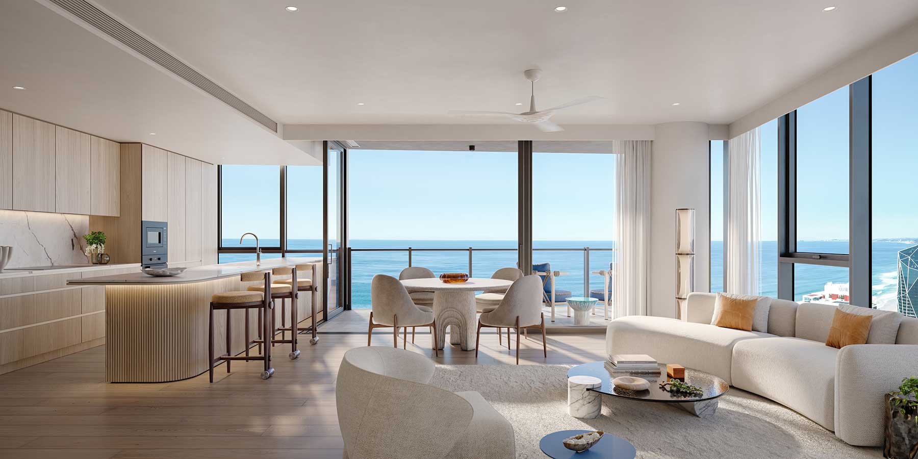Open-plan living room with ocean views at a luxury apartment in Palmera Residences on the Gold Coast.